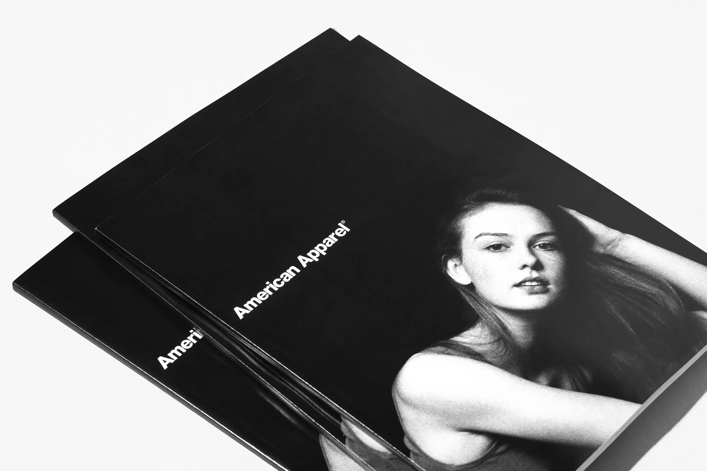 Stacked American Apparel print catalogs